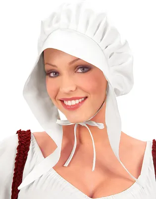 A woman wearing a historical costume, including a white bonnet.