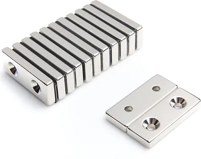 Produktbild von Neodym Magnet 40 x 15 x 5 mm N38 mit Bohrung für Schraube Quader Case - 1 Stück
