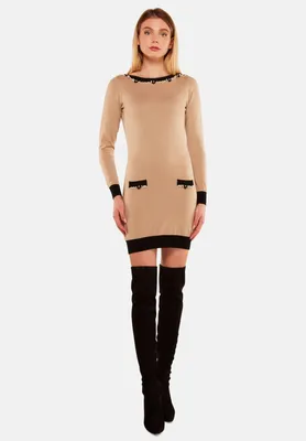 Produktbild von Classy Vintage Kleid mit eleganten Perlenverzierungen und schwarzen Akzenten