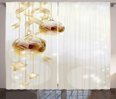 Christmas ornaments and ribbons hanging against a soft, blurred background.