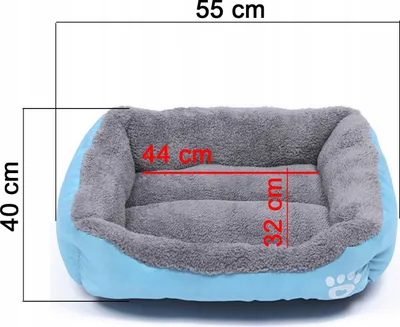 A blue and gray dog bed with dimensions indicated by red lines and text.