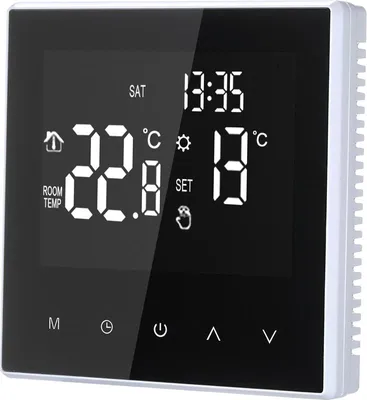 A digital thermostat with a large LCD screen displaying temperature and time.
