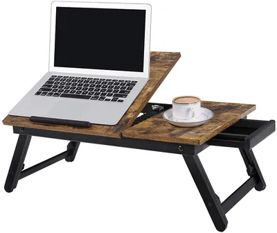 A laptop table with a laptop and a cup of coffee on it, set against a white background.