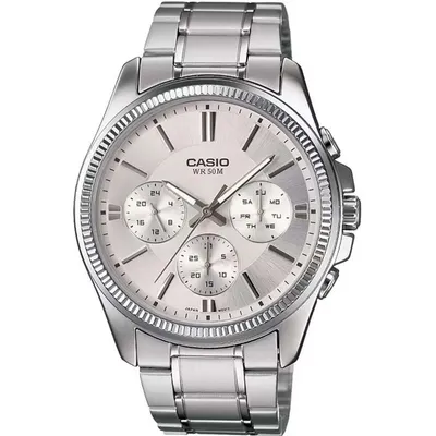 A close-up studio shot of a silver Casio watch.