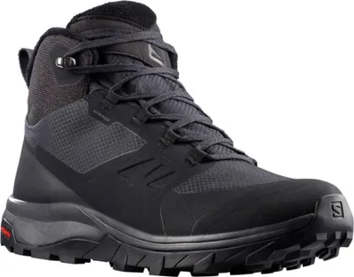 A black Salomon hiking boot.