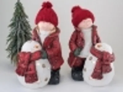 Produktbild von Deko Figur Kind mit Schneemann sortiert Junge oder Mädchen