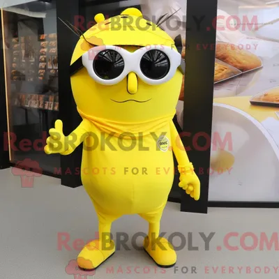 Obrázek produktu pro Citronově REDBROKOLY žlutá postava maskota Moussaka oblečená v pouzdrových šatech a slunečních brýlích