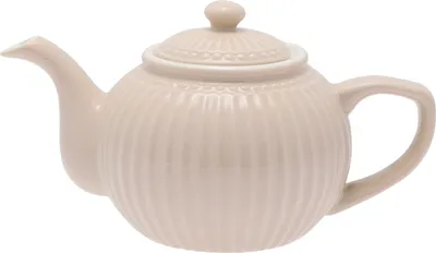 A studio shot of a ceramic teapot.