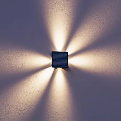 Produktbild von Calex Altamura Solar Wandleuchte, warmweißes Up & Down Licht, solarbetrieben, kabellos, wasserdicht, Schwarz