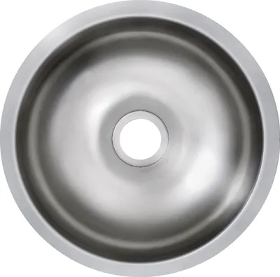 A top-down view of a stainless steel sink with a central drain hole.