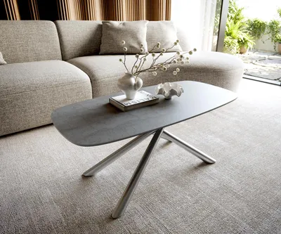 Produktbild von DELIFE Couchtisch Edge Boot 100x50 cm Keramik Beton Grau Sarity Edelstahl gebürstet