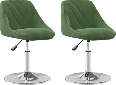 Two green velvet swivel chairs with silver bases are shown against a white background.