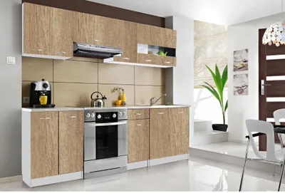 A modern kitchen setup with wooden cabinets, stainless steel appliances, and a window with blinds.