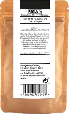 The image shows the back of a small brown paper packaging for a food product, with text and a barcode.