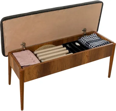 An open storage bench with items inside.
