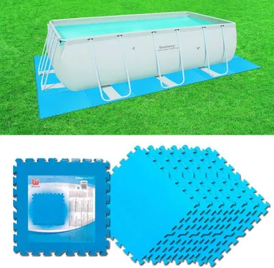 A rectangular swimming pool is shown on a grassy lawn, supported by a blue mat. Below, a package of blue interlocking foam mats is displayed.