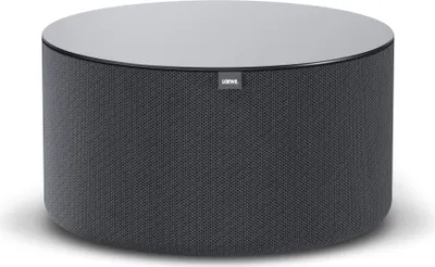 A cylindrical, dark gray subwoofer with a light gray top, placed on a white background.