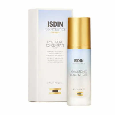 A product shot of a serum bottle and its packaging, presented on a white background.