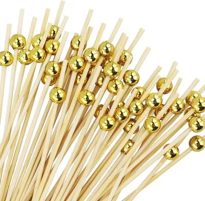Produktbild von Bambus Cocktailstäbchen - 110 Stück - mit goldenem Perlenkopf - 12 cm