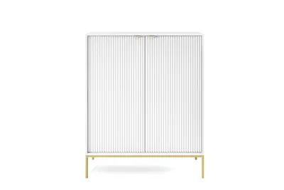 A white, fluted cabinet with gold legs and handles, presented on a white background.