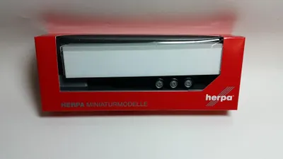 Productafbeelding van Herpa vrachtwagenmodel, aanhanger met beweegbaar chassis, schaal 1:87, kunststof, gemaakt in Duitsland, zwart