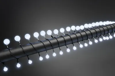 Immagine prodotto di Konstsmide - Globelichterkette a LED, diodi rotondi piccoli e grandi, 80 diodi bianchi freddi, trasformatore per esterni da 24 V, cavo nero; 3680-207