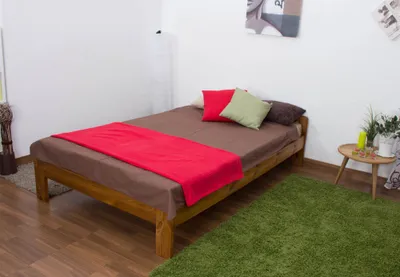 Produktbild von Einzelbett / Gästebett Kiefer Vollholz massiv Eichefarben A8, inkl. Lattenrost - Abmessungen: 120 x 200 cm
