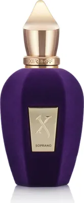 A studio shot of a purple perfume bottle with a gold accent.