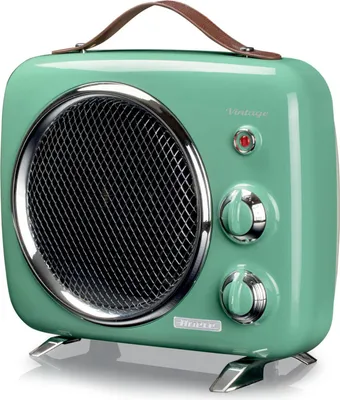 A mint green vintage-style fan heater with a brown leather handle and chrome accents.