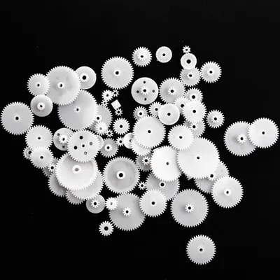 Image de Différents styles d'engrenages en plastique blanc 58 pièces pour les jouets RC W5J2