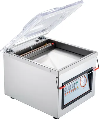 A vacuum sealer machine with its lid open, shown in an isolated studio shot.