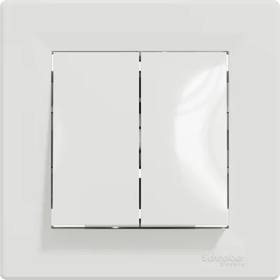 A white double light switch on a white background.