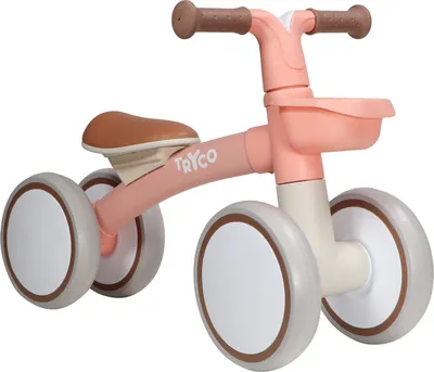 A pink balance bike for toddlers.