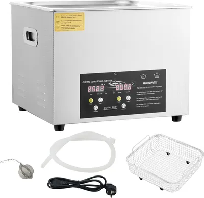 A digital ultrasonic cleaner with accessories displayed below it.
