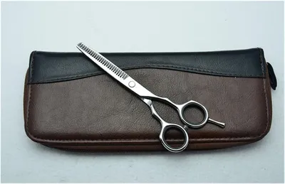 Produktbild von Friseur- und Effilierschere als Schneidewerkzeug für das Haarstyling