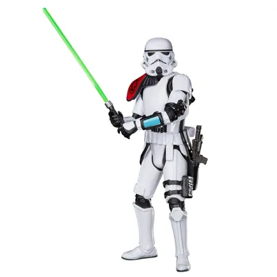 A Star Wars Black Series Sergeant Kreel action figure holding a green lightsaber.