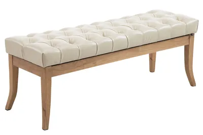 A tufted cream-colored bench with light brown wooden legs, presented on a white background.