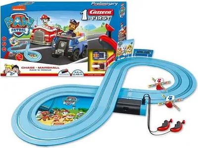 A Paw Patrol Carrera First race track set with cars and packaging.