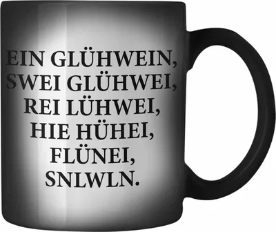 Produktbild von Trendation - Ein Glühwein Farbwechsel Zauber-Tasse Lustig Spruch Glühweinbecher mit Henkel Doppelwandig GlühweinFarbwechsel Zauber-Tassen Gläser Weihnachtsmarkt Becher Farbwechsel Zauber-Tassen Geschenk - Ein Glühwein Swei (Schwarz)