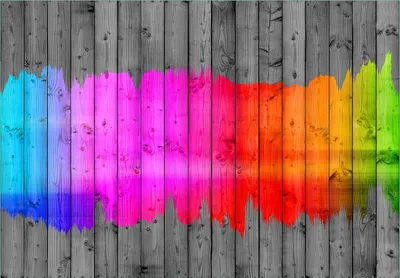 Produktbild von Wallario Fototapete Vliestapete, seidenmatte Oberfläche, einfache Verarbeitung, Größe 200 x 140 cm, Motiv Holzpaneel - Bemaltes buntes Holz