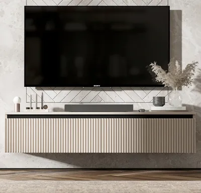 A modern TV stand with a wall-mounted TV above it.