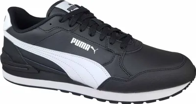A studio shot of a black Puma sneaker with white accents.