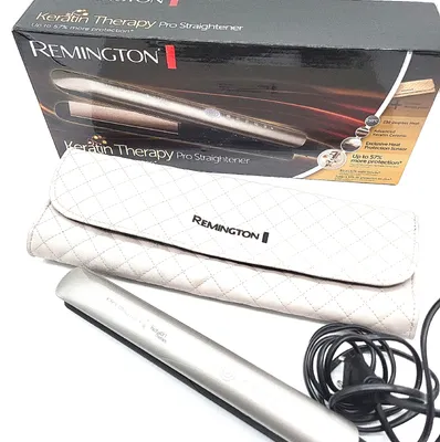 A Remington Keratin Therapy Pro Straightener is shown with its packaging and a storage pouch.