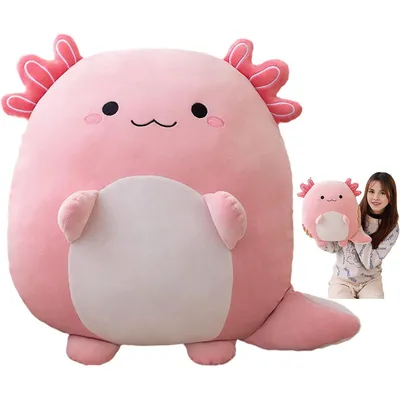 A large pink axolotl plush toy is shown in the foreground, with a smaller version of the same toy held by a woman in the background.