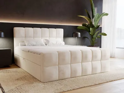 A bedroom scene with a bed as the main focus.