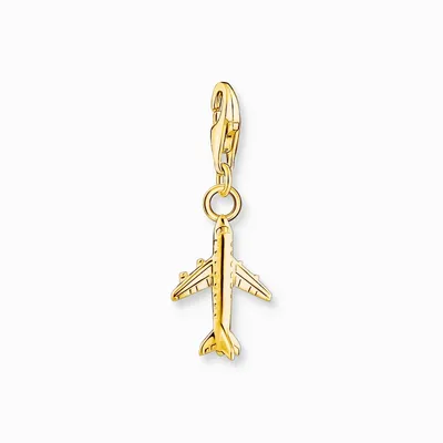 A gold-colored airplane charm hanging from a clasp.