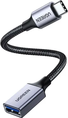 A studio shot of a USB-C to USB-A OTG adapter cable.