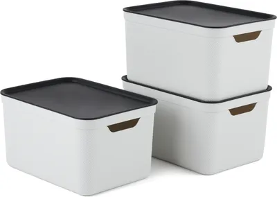 Three white storage boxes with black lids are stacked and arranged on a white background.