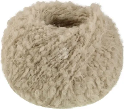 A ball of fluffy, cream-colored yarn.