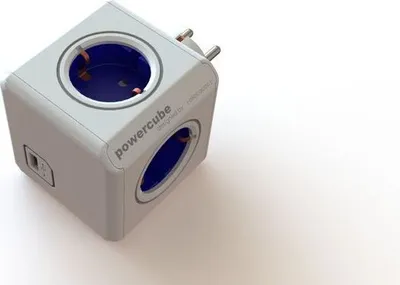A white cube-shaped power strip with multiple outlets.